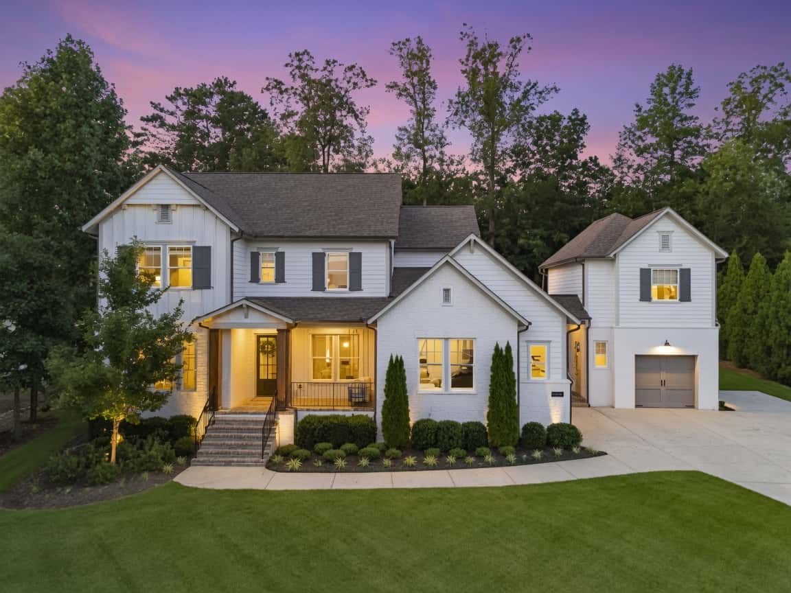Luxury home in the gated Litchfield Hundred community in Roswell, GA at dusk
