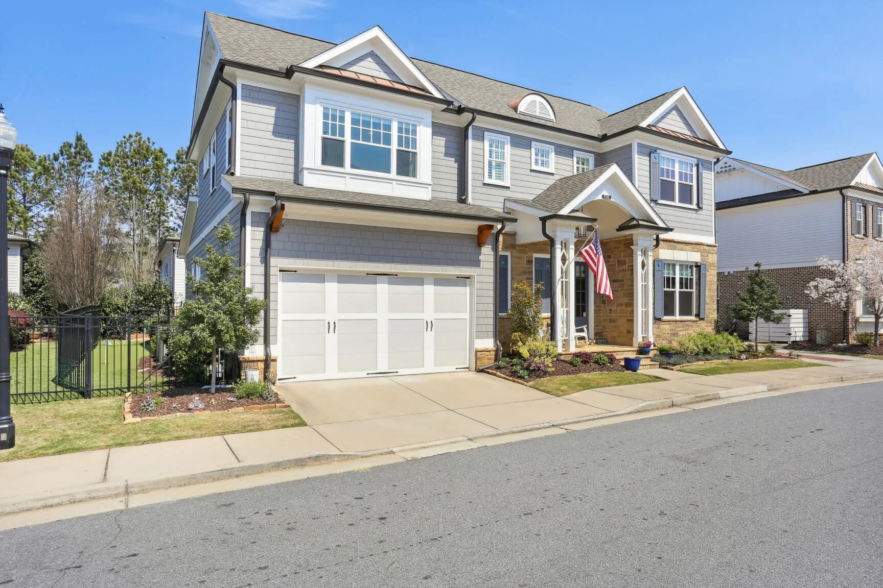 Street view of the walkable, sidewalk-lined East of Main community.